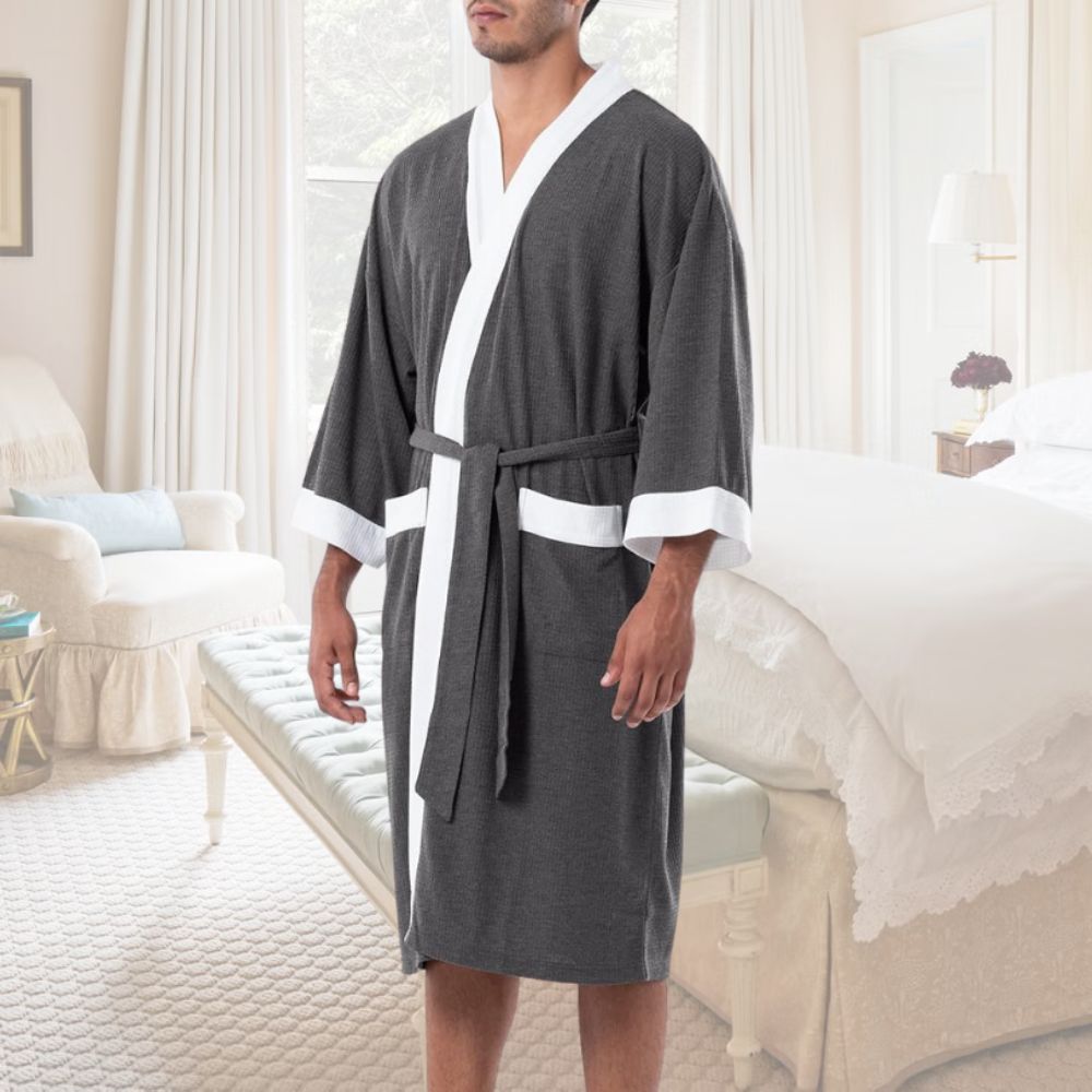 A lightweight waffle weave bathrobe holding a garden bed line
